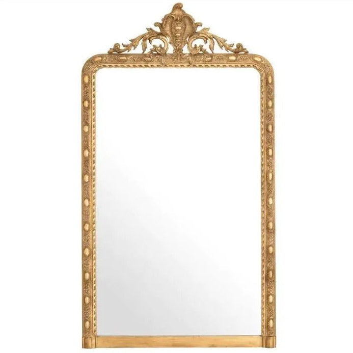 Decorative gold-framed mirror on a white background