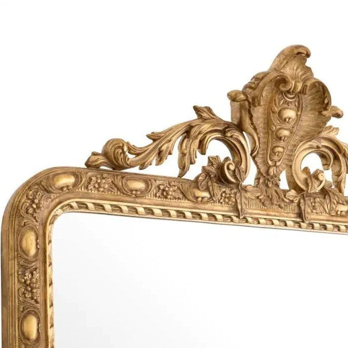Decorative gold frame with intricate designs on a white background