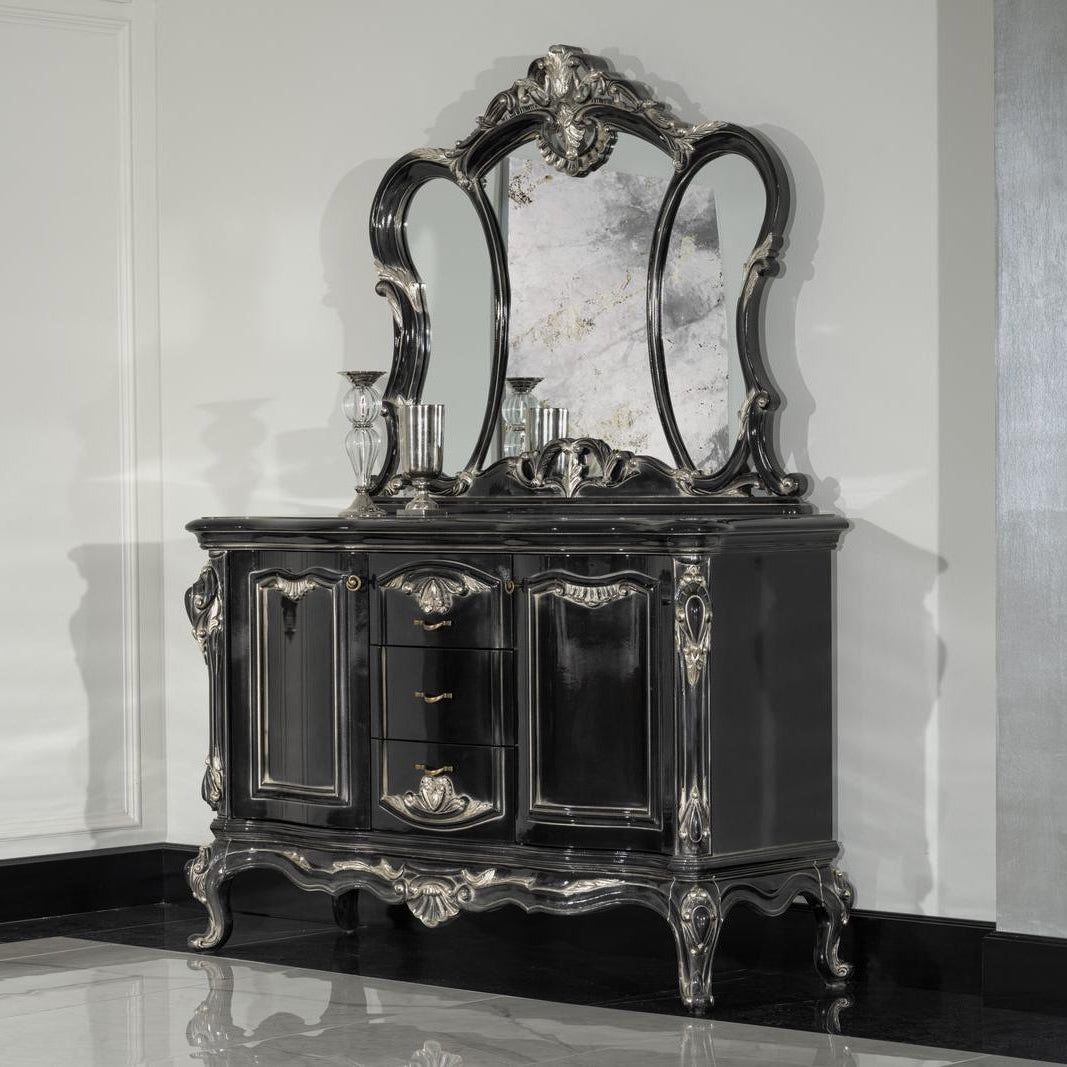 Decorative black cabinet with a large mirror in a room with white walls and a marble wall.