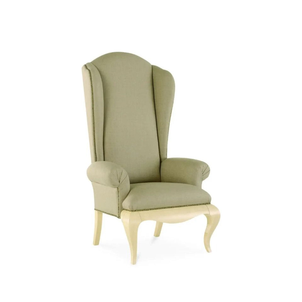 Green armchair with high backrest on a white background
