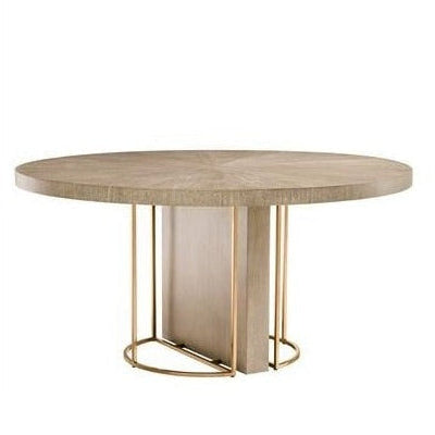 Round wooden table with gold metal base on a white background