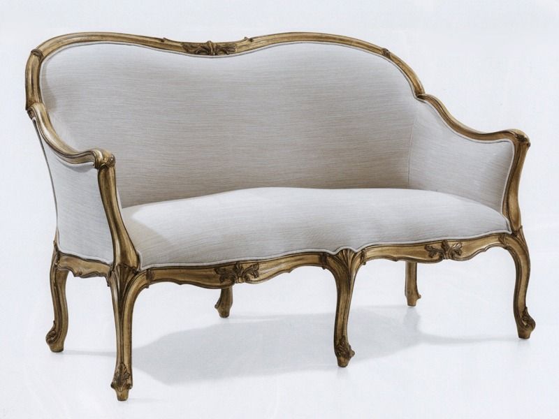 Custom made French sofa with hand carved champagne and gold solid wood frame and champagne tufted upholstery