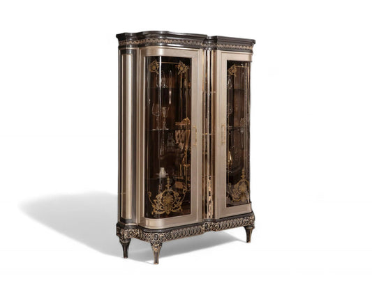 An luxurious French style vitrine display cabinet with intricate gold details and a champagne finish, featuring glass doors and mahogany wood frame.