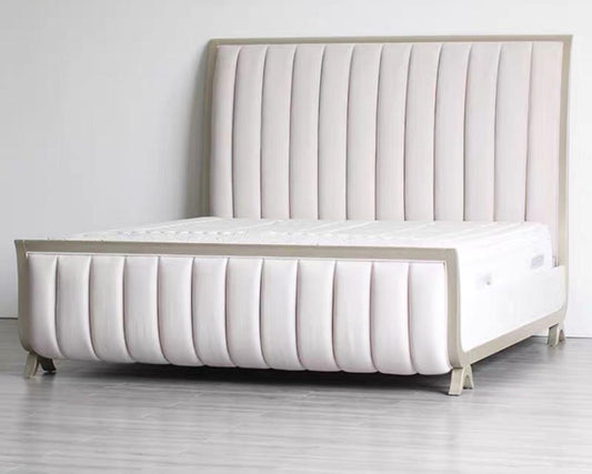 A 'light luxury' style bed frame with a beige upholstered headboard and footboard, featuring gold elements and a made-to-measure design.