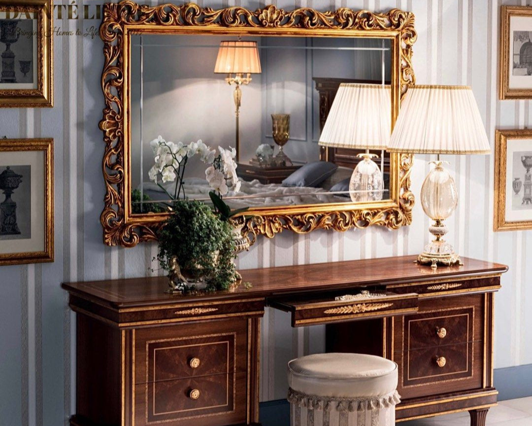 An elegant LORENZO Italian vanity set with a wooden table, mirror, and pouf seat, featuring intricate gold details and a luxurious lacquer finish.
