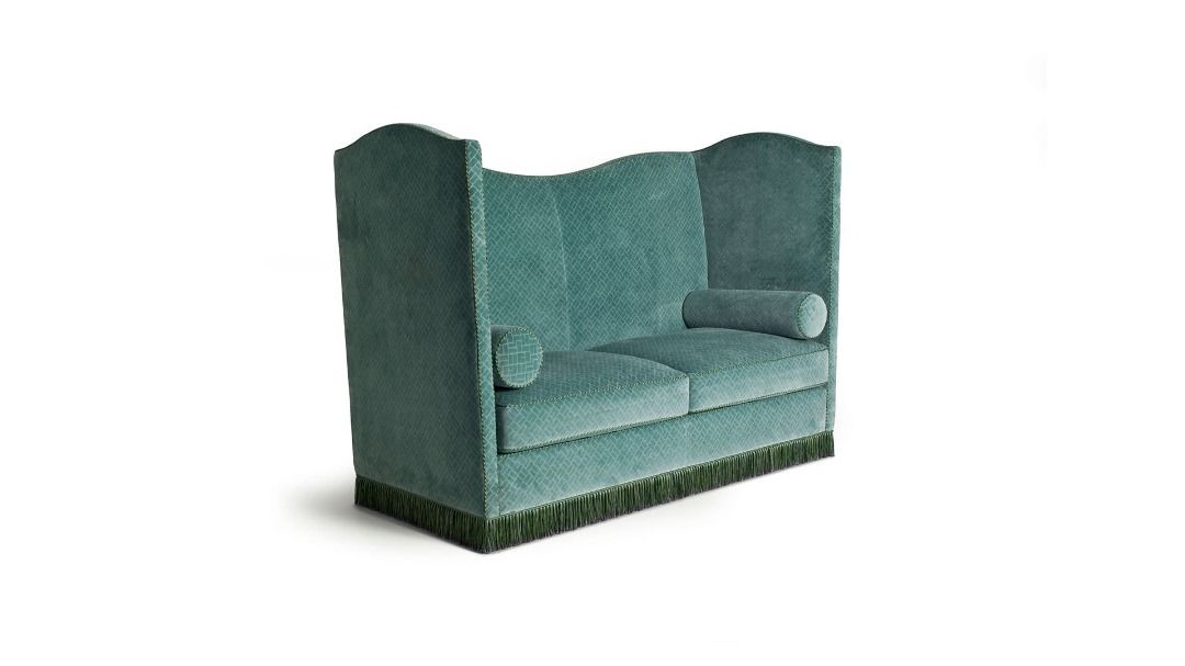 Green sofa on a white background