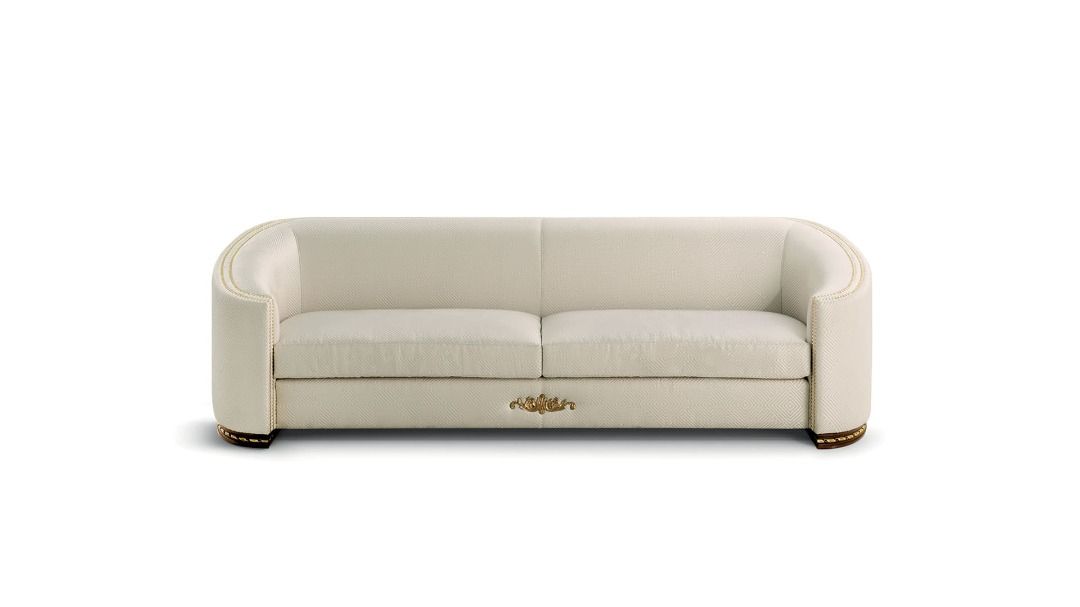 Beige sofa with a visible brand logo on a white background
