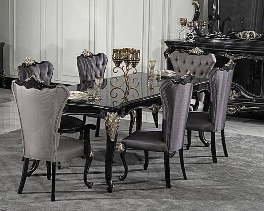 A luxurious baroque dining set with a black lacquered dining table and six upholstered chairs, featuring intricate carved details and a sleek design.