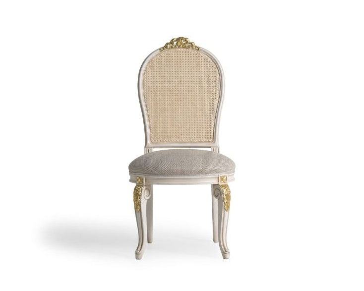 Victorian Rattan Dining Chair finished in white and gold accents, using mahogany wood