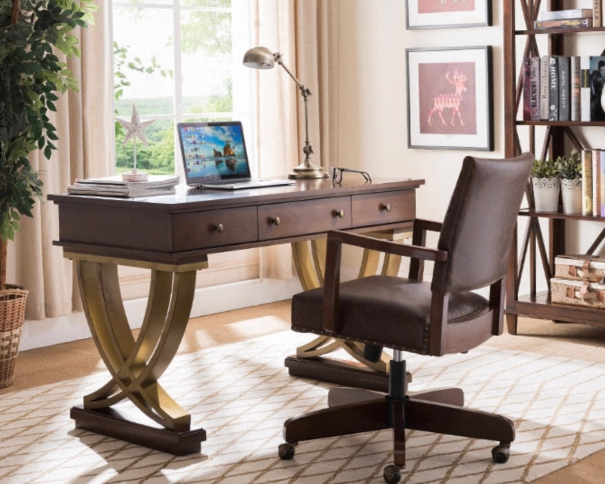 Home office setup with a wooden desk, chair, and decor.