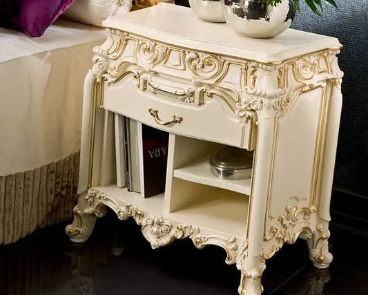 Decorative nightstand with gold accents in a bedroom setting