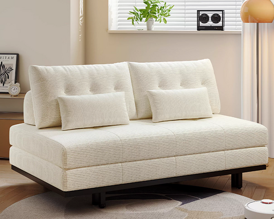 White sofa bed with cushions in a living room setting. Size from single to king