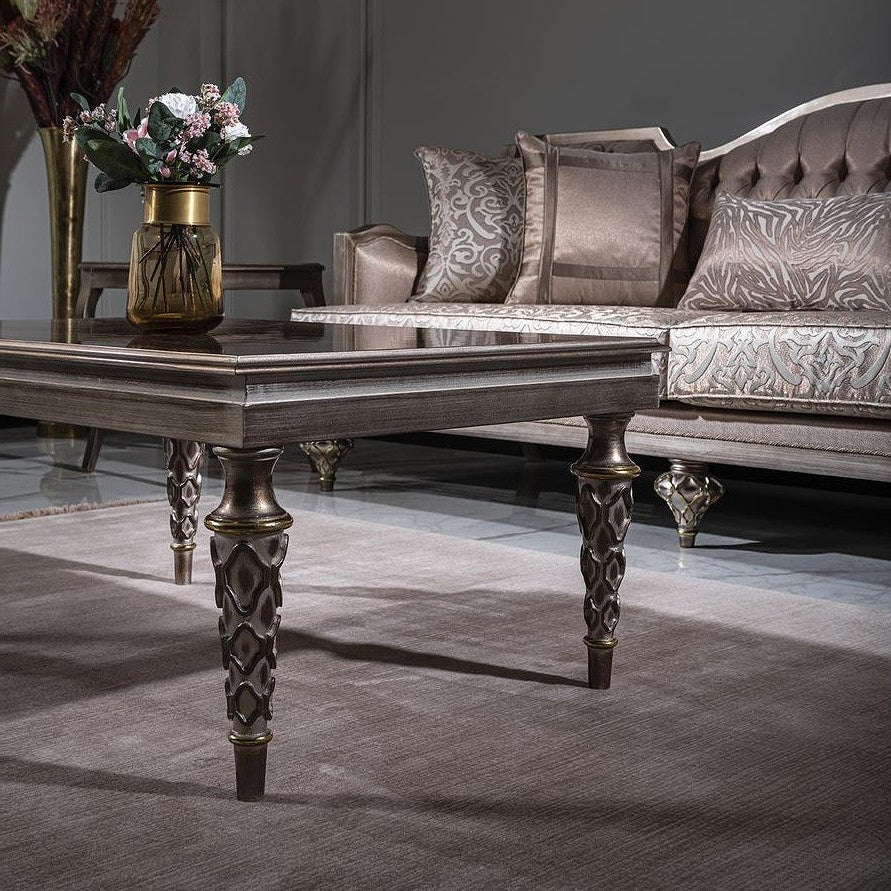 Luxury living room with a decorative table and sofa.