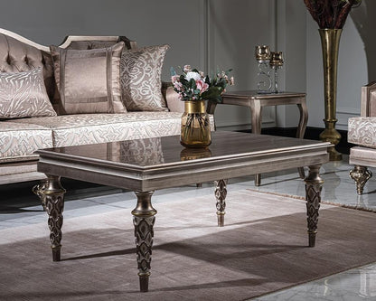 Decorative living room with a coffee table, sofa, and decorative items.