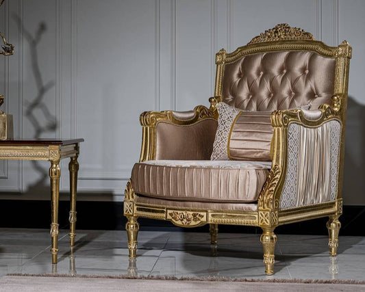 Decorative armchair with gold accents and tufted brown cushion in a room setting.