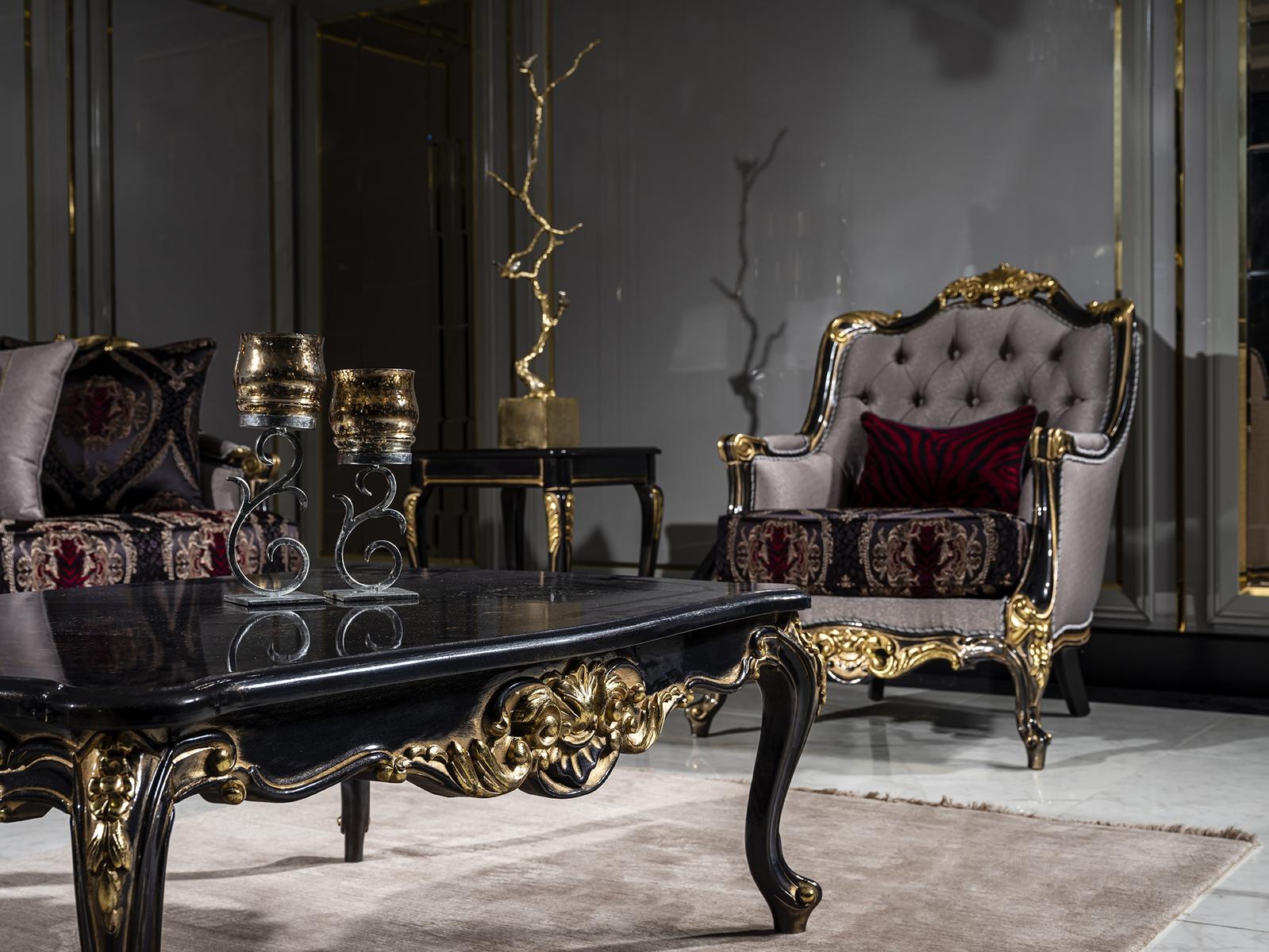 Luxurious living room with ornate furniture and decorative elements.