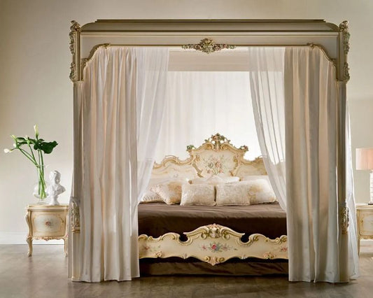 Luxurious bedroom with a canopy bed, ornate furniture, and decorative elements.