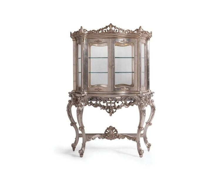 Decorative glass cabinet with ornate metal frame on a white background
