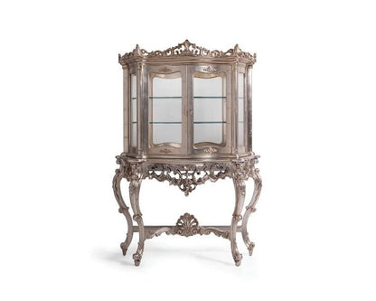Decorative glass cabinet with ornate metal frame on a white background