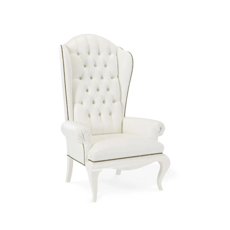 White upholstered chair with tufted backrest on a white background