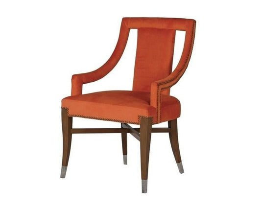 Orange upholstered chair with wooden frame on a white background