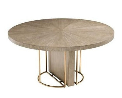 Round wooden table with a gold metal base on a white background