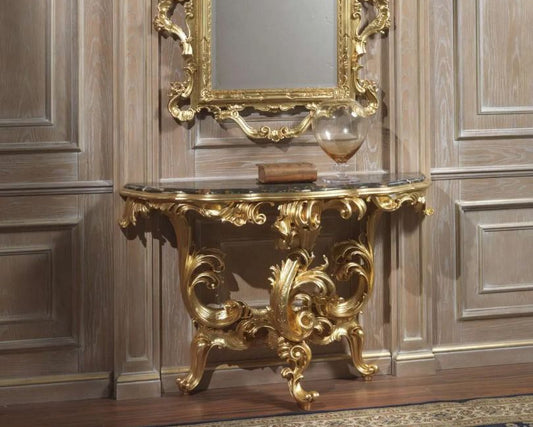 Decorative gold console table with mirror against a wooden paneled wall
