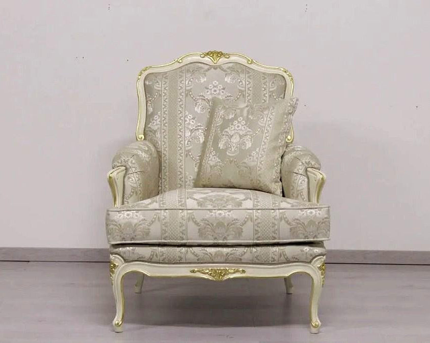 Decorative armchair with floral patterns on a plain background
