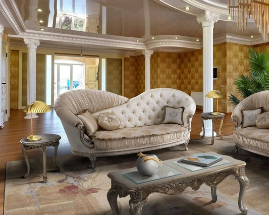 Luxurious living room with ornate furniture and decorative elements.