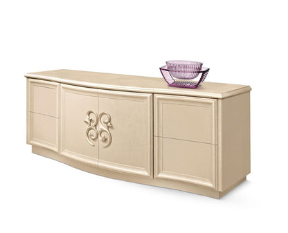 Beige sideboard with decorative elements on a white background