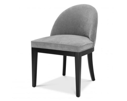 Gray upholstered chair with black legs on a white background