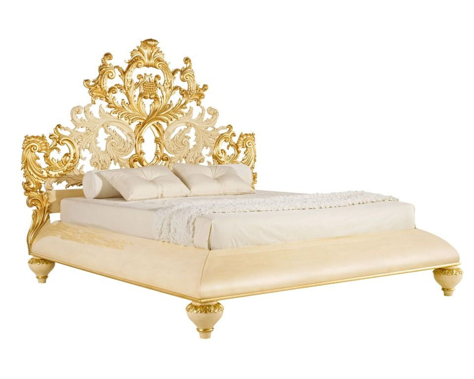 French Victorian Baroque bed with gold headboard and white bedding