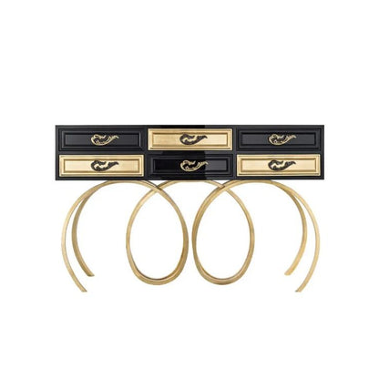 Set of gold hoop earrings with a black and gold jewelry box on a white background