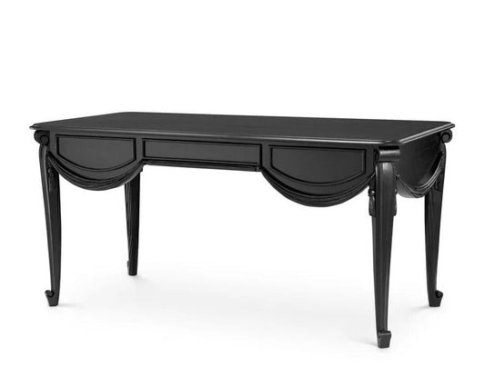 Black decorative table with curved legs on a white background