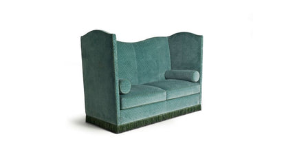 Green sofa on a white background