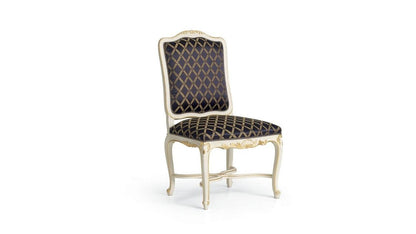 Decorative chair with black patterned seat on a white background