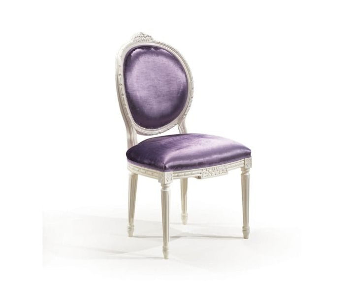 Purple velvet chair with silver frame on a white background