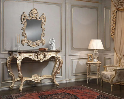 Elegant interior with ornate console table, mirror, and chair in a room with light gray walls and beige curtains.
