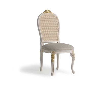 Victorian Rattan Dining Chair finished in white and gold accents, using mahogany wood