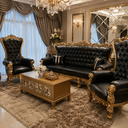 Luxury living room furniture set featuring a black tufted leather sofa, two matching high-back armchairs with ornate gold frames, a carved gold coffee table, and a plush brown shag rug in an elegant room.