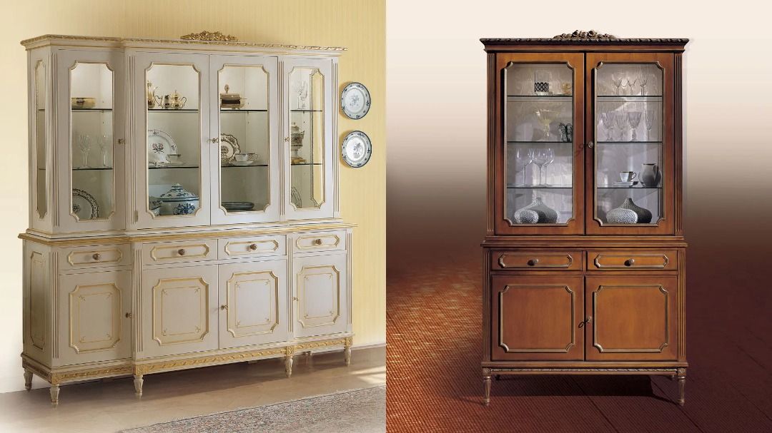Two wooden display cabinets, one beige and one brown, on a plain background.