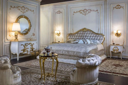 Luxurious bedroom with ornate furniture and decorative elements.